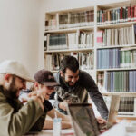 Everyone in the office laughs and jokes with each other